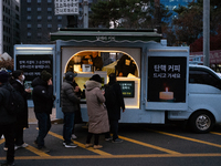 At the rally across from the National Assembly in Seoul, South Korea, on December 12, 2024, thousands of citizens gather to call for the imp...