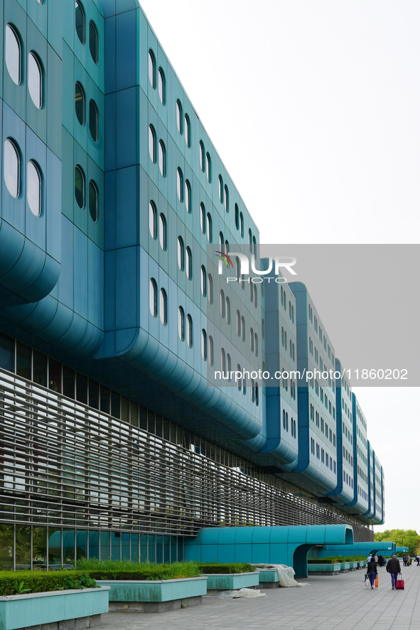 People stand in front of the Clinical Hospital Dubrava in Zagreb, Croatia, on April 28, 2023. The hospital ranks among the top medical facil...