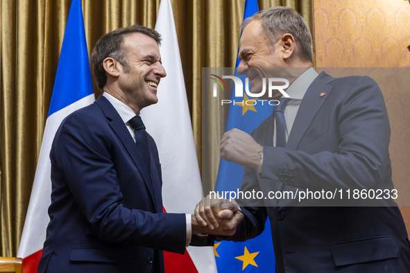 Prime Minister Donald Tusk (R) and French President Emmanuel Macron during a meeting at the Prime Minister's Office in Warsaw. The leaders w...