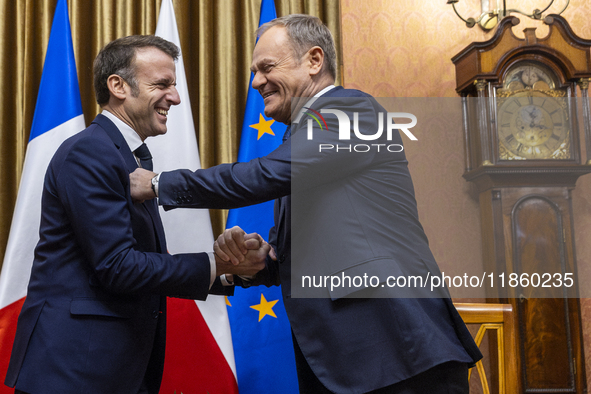 Prime Minister Donald Tusk (R) and French President Emmanuel Macron during a meeting at the Prime Minister's Office in Warsaw. The leaders w...