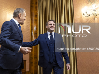 Prime Minister Donald Tusk (L) and French President Emmanuel Macron during a meeting at the Prime Minister's Office in Warsaw. The leaders w...