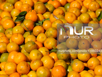 Oranges are pictured at a marketplace in Kathmandu, Nepal, on December 12, 2024. Nepali fruit markets are flooded with oranges as the season...