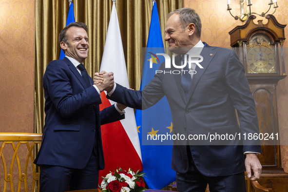 Prime Minister Donald Tusk (R) and French President Emmanuel Macron during a meeting at the Prime Minister's Office in Warsaw. The leaders w...