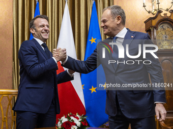 Prime Minister Donald Tusk (R) and French President Emmanuel Macron during a meeting at the Prime Minister's Office in Warsaw. The leaders w...