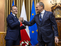 Prime Minister Donald Tusk (R) and French President Emmanuel Macron during a meeting at the Prime Minister's Office in Warsaw. The leaders w...