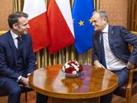 Prime Minister Donald Tusk (R) and French President Emmanuel Macron during a meeting at the Prime Minister's Office in Warsaw. The leaders w...