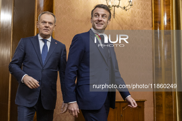 Prime Minister Donald Tusk (L) and French President Emmanuel Macron during a meeting at the Prime Minister's Office in Warsaw. The leaders w...