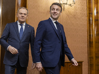 Prime Minister Donald Tusk (L) and French President Emmanuel Macron during a meeting at the Prime Minister's Office in Warsaw. The leaders w...