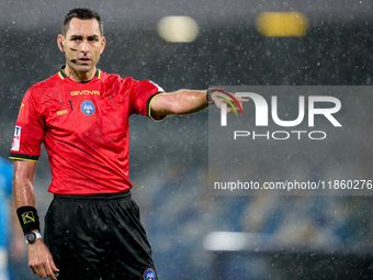 Referee Andrea Colombo gestures during the serie Serie A Enilive match between SSC Napoli and SS Lazio at Stadio Diego Armando Maradona on D...