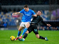 Scott McTominay of SSC Napoli and Mario Gila of SS Lazio compete for the ball during the serie Serie A Enilive match between SSC Napoli and...