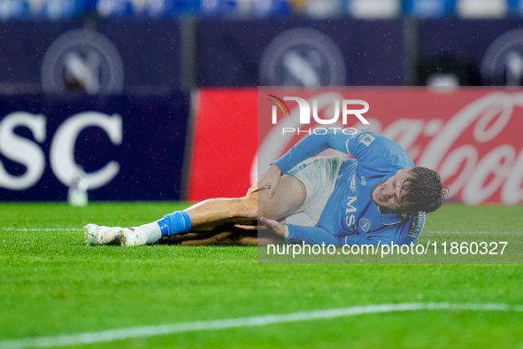 Khvicha Kvaratskhelia of SSC Napoli lies down injured during the serie Serie A Enilive match between SSC Napoli and SS Lazio at Stadio Diego...