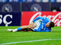 Khvicha Kvaratskhelia of SSC Napoli lies down injured during the serie Serie A Enilive match between SSC Napoli and SS Lazio at Stadio Diego...