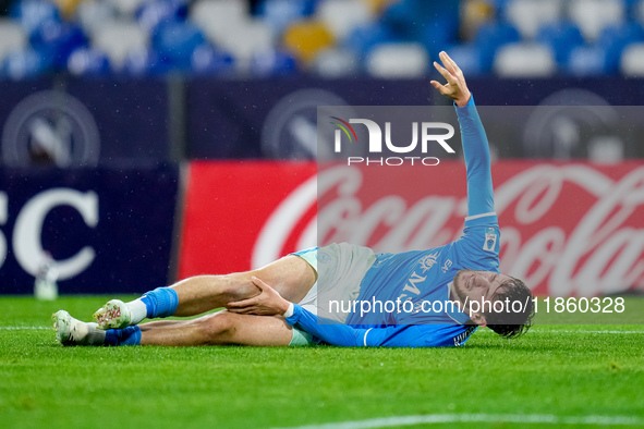 Khvicha Kvaratskhelia of SSC Napoli lies down injured during the serie Serie A Enilive match between SSC Napoli and SS Lazio at Stadio Diego...