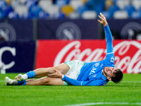 Khvicha Kvaratskhelia of SSC Napoli lies down injured during the serie Serie A Enilive match between SSC Napoli and SS Lazio at Stadio Diego...