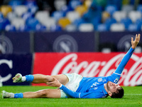 Khvicha Kvaratskhelia of SSC Napoli lies down injured during the serie Serie A Enilive match between SSC Napoli and SS Lazio at Stadio Diego...