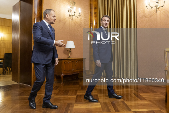 Prime Minister Donald Tusk (L) and French President Emmanuel Macron during a meeting at the Prime Minister's Office in Warsaw. The leaders w...