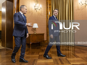 Prime Minister Donald Tusk (L) and French President Emmanuel Macron during a meeting at the Prime Minister's Office in Warsaw. The leaders w...