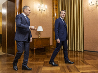 Prime Minister Donald Tusk (L) and French President Emmanuel Macron during a meeting at the Prime Minister's Office in Warsaw. The leaders w...