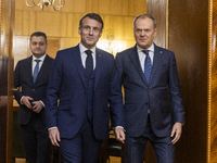 Prime Minister Donald Tusk (L) and French President Emmanuel Macron during a meeting at the Prime Minister's Office in Warsaw. The leaders w...