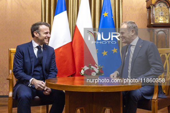 Prime Minister Donald Tusk (R) and French President Emmanuel Macron during a meeting at the Prime Minister's Office in Warsaw. The leaders w...