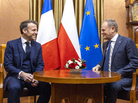 Prime Minister Donald Tusk (R) and French President Emmanuel Macron during a meeting at the Prime Minister's Office in Warsaw. The leaders w...