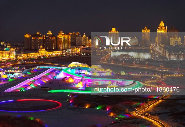 Tourists play at the Manzhouli ''Ice and Snow Nursery Rhyme'' theme park in Hulunbuir, Inner Mongolia, China, on December 12, 2024. 