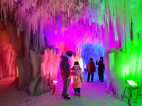 Tourists play at the Manzhouli ''Ice and Snow Nursery Rhyme'' theme park in Hulunbuir, Inner Mongolia, China, on December 12, 2024. (