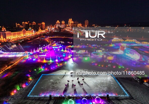 Tourists play at the Manzhouli ''Ice and Snow Nursery Rhyme'' theme park in Hulunbuir, Inner Mongolia, China, on December 12, 2024. 