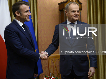 Polish Prime Minister Donald Tusk welcomes French President Emmanuel Macron in Warsaw, Poland, on December 11, 2024. (