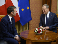 Polish Prime Minister Donald Tusk welcomes French President Emmanuel Macron in Warsaw, Poland, on December 12, 2024. (