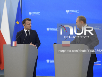 French President Emmanuel Macron and Polish Prime Minister Donald Tusk hold a press conference after talks in Warsaw, Poland, on December 12...