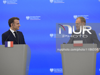 French President Emmanuel Macron and Polish Prime Minister Donald Tusk hold a press conference after talks in Warsaw, Poland, on December 12...