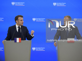 French President Emmanuel Macron gestures as he speaks during a press conference with Polish Prime Minister Donald Tusk after talks in Warsa...