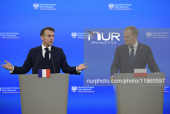 French President Emmanuel Macron and Polish Prime Minister Donald Tusk hold a press conference after talks in Warsaw, Poland, on December 12...