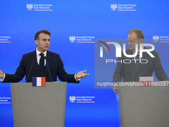 French President Emmanuel Macron and Polish Prime Minister Donald Tusk hold a press conference after talks in Warsaw, Poland, on December 12...