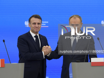 French President Emmanuel Macron and Polish Prime Minister Donald Tusk hold a press conference after talks in Warsaw, Poland, on December 12...