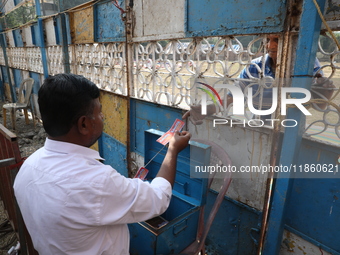 A man buys a ticket from a ticket counter at the Ajanta Circus entry gate in Kolkata, India, on December 12, 2024. There are currently fewer...