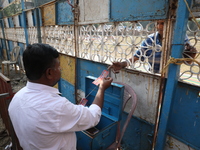 A man buys a ticket from a ticket counter at the Ajanta Circus entry gate in Kolkata, India, on December 12, 2024. There are currently fewer...