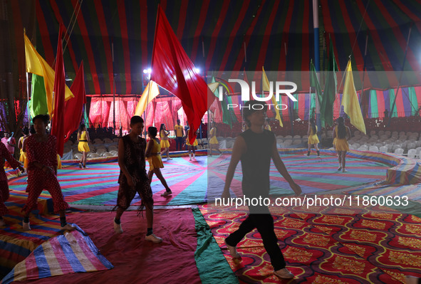 Circus artists perform during a show of the Ajanta Circus in Kolkata, India, on December 12, 2024. There are currently fewer than 30 circuse...