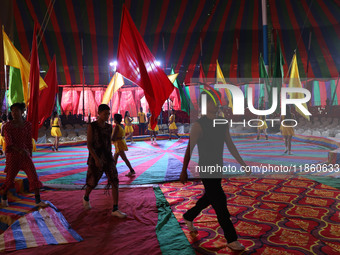 Circus artists perform during a show of the Ajanta Circus in Kolkata, India, on December 12, 2024. There are currently fewer than 30 circuse...