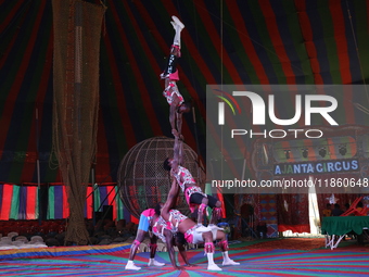 Circus artists perform during a show of the Ajanta Circus in Kolkata, India, on December 12, 2024. There are currently fewer than 30 circuse...