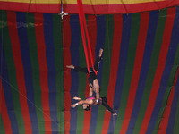 Trapeze artists perform during a show of the Ajanta Circus in Kolkata, India, on December 12, 2024. There are currently fewer than 30 circus...