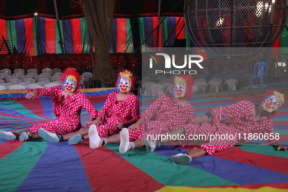 Clowns perform during a show of the Ajanta Circus in Kolkata, India, on December 12, 2024. There are currently fewer than 30 circuses operat...