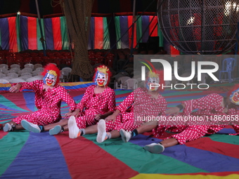 Clowns perform during a show of the Ajanta Circus in Kolkata, India, on December 12, 2024. There are currently fewer than 30 circuses operat...