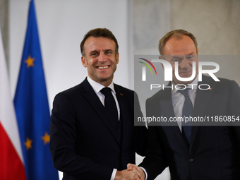 In Warsaw, Poland, on December 12, 2024, President of the French Republic Emmanuel Macron meets with Prime Minister of Poland Donald Tusk at...