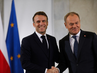 In Warsaw, Poland, on December 12, 2024, President of the French Republic Emmanuel Macron meets with Prime Minister of Poland Donald Tusk at...