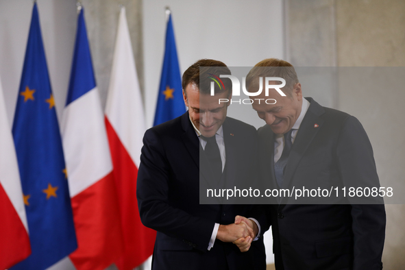 In Warsaw, Poland, on December 12, 2024, President of the French Republic Emmanuel Macron meets with Prime Minister of Poland Donald Tusk at...