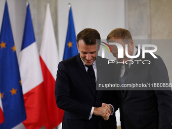 In Warsaw, Poland, on December 12, 2024, President of the French Republic Emmanuel Macron meets with Prime Minister of Poland Donald Tusk at...