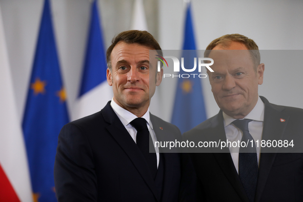 In Warsaw, Poland, on December 12, 2024, President of the French Republic Emmanuel Macron meets with Prime Minister of Poland Donald Tusk at...