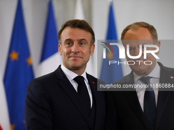 In Warsaw, Poland, on December 12, 2024, President of the French Republic Emmanuel Macron meets with Prime Minister of Poland Donald Tusk at...